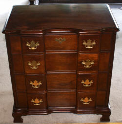 Use a bachelor's chest for bedrooms . Block front Chippendale bachelors chest